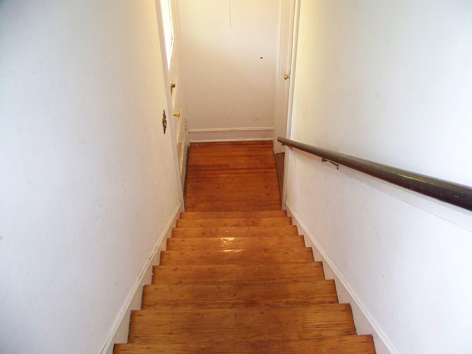 Private staircase leading to apartment