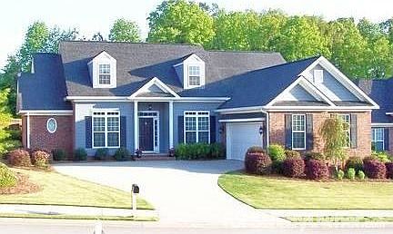 Great lot with courtyard entry garage
						:
						Home is brick with hardyplank accents.