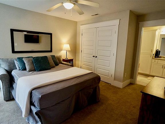 A spacious first floor bedroom with 2 large closets and a full bathroom.
