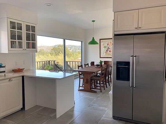 Kitchen, with sliding doors onto deck.