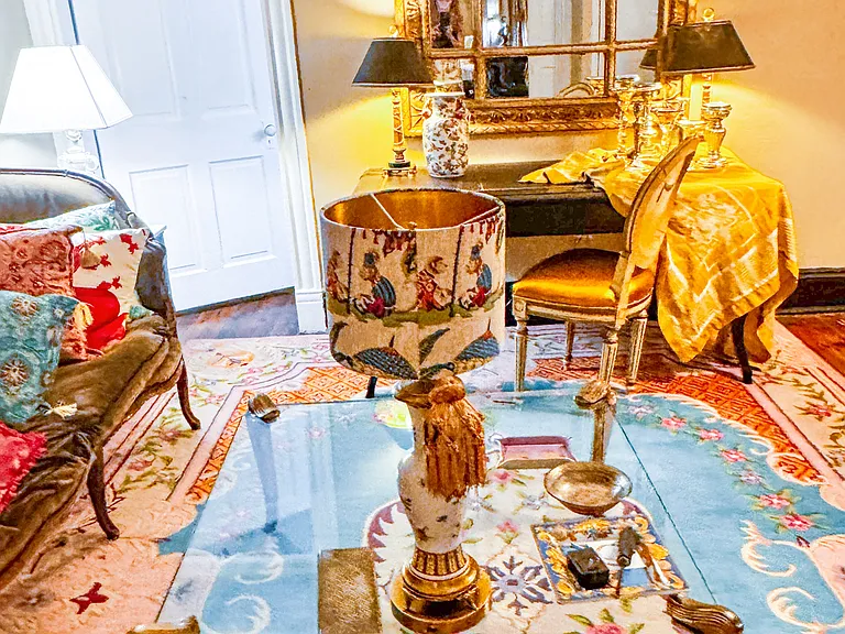 Parlour with a lovely antique table for work or dining.