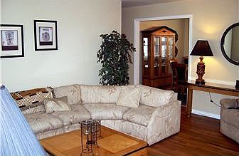 Large living room with lots of natural light
