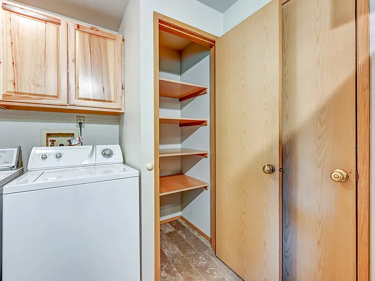 Huge Pantry and Door to the Garage.