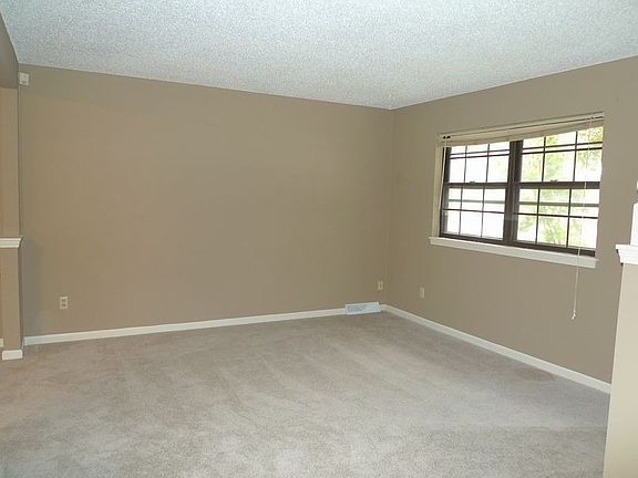 New carpet & paint in the light & airy Living Room!