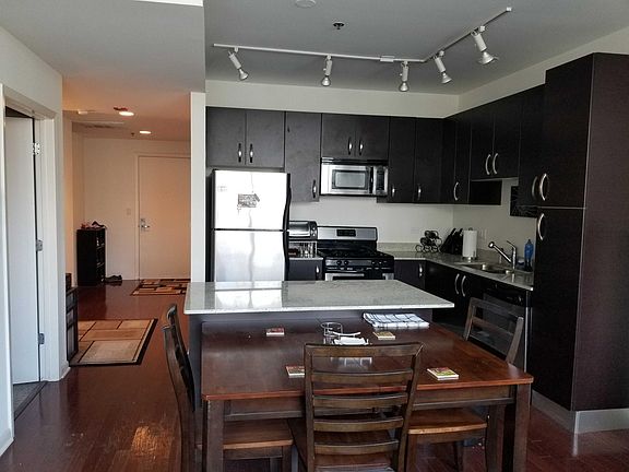 Stainless steel appliances, hardwood floors