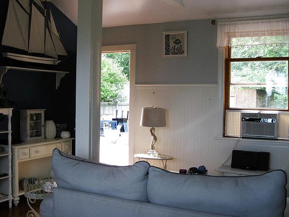 vaulted living room, door out to the large deck. funrniture is negotiable