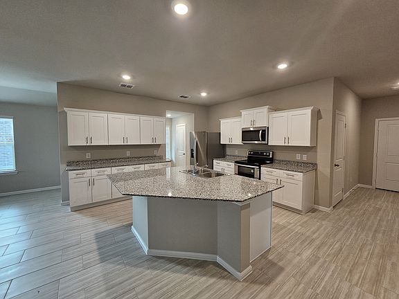 Kitchen with SS Appliances