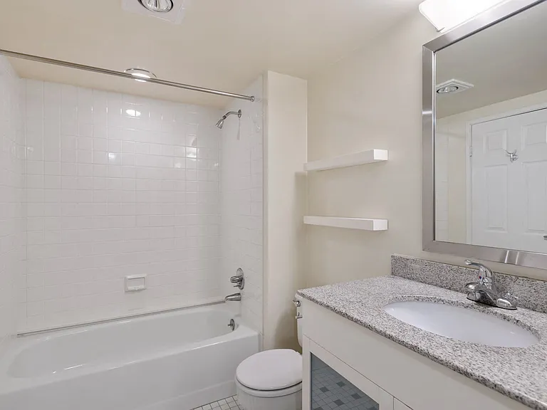 Renovated bathroom with granite countertops