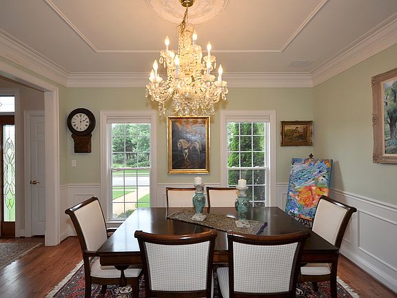 Bright dining room to your left from the front entrance