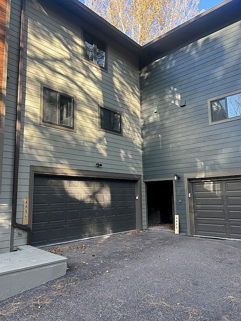 Outside View of 2- Garage on left