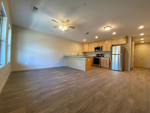 Light and open living room, kitchen and dining area floor plan