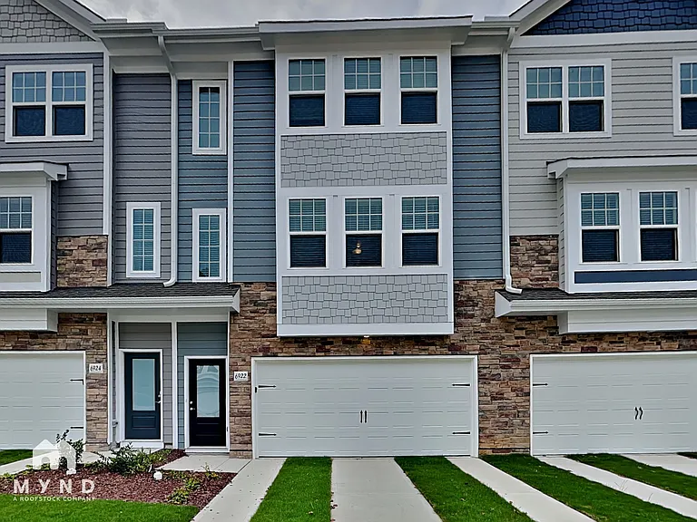 6933 Woodland Stream Pl — Photo 1