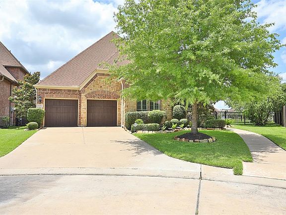 Double garage with plenty of driveway parking.