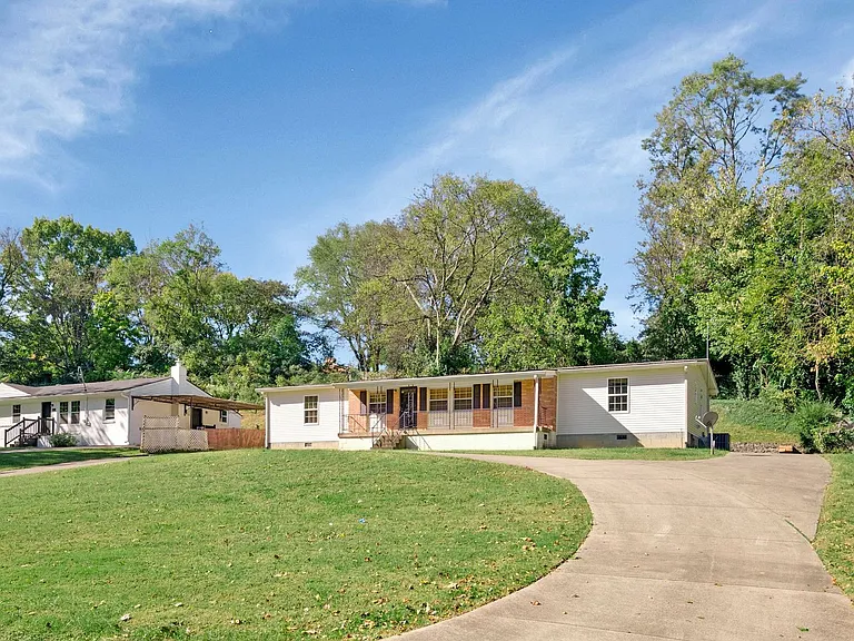 4857 Torbay Dr — Photo 2