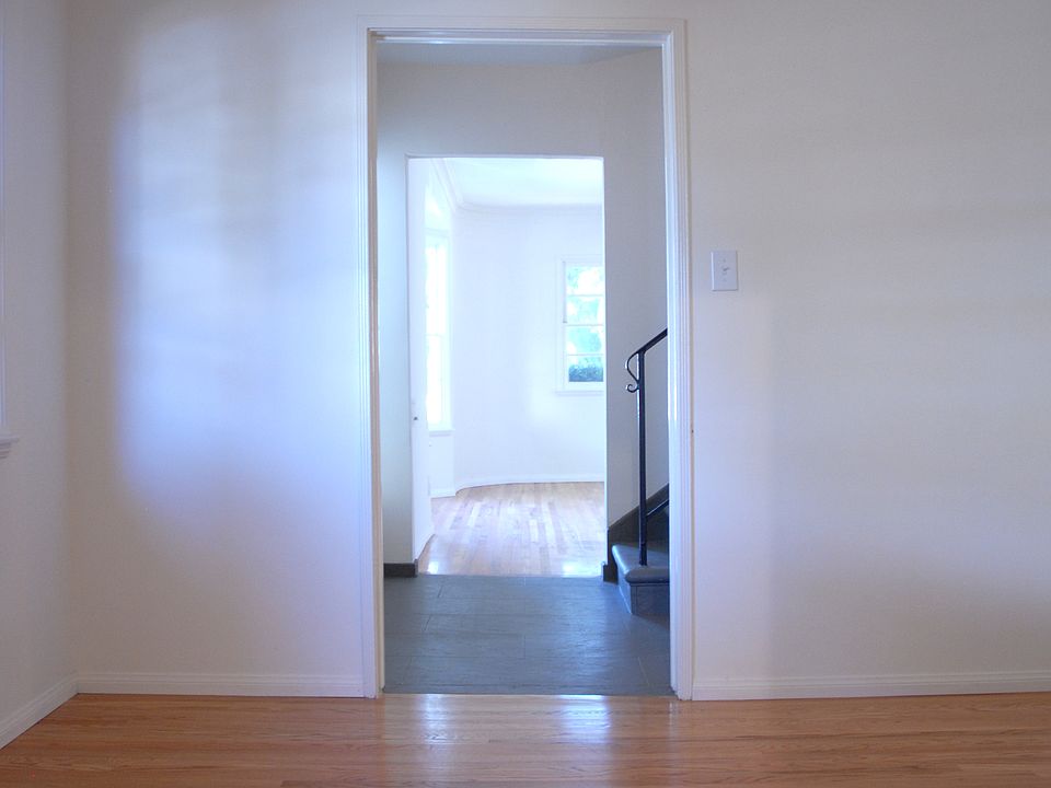 Dining Room looking into entry way and past that, into the living room.