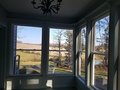 Sun porch with view of pond