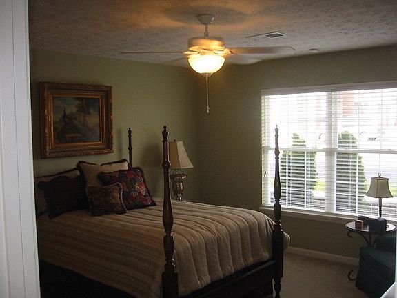 The master bedroom has plenty of room to entertain