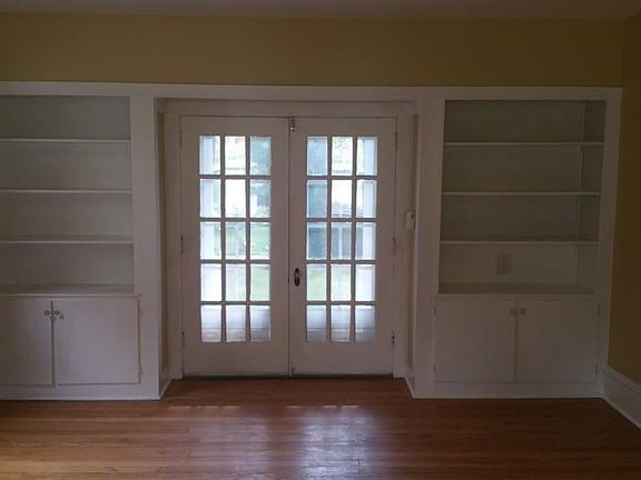 built-ins and French doors towards porch
