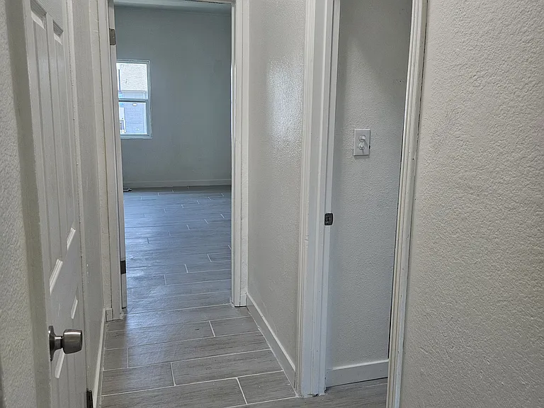 Hallway to primary bedroom on second floor