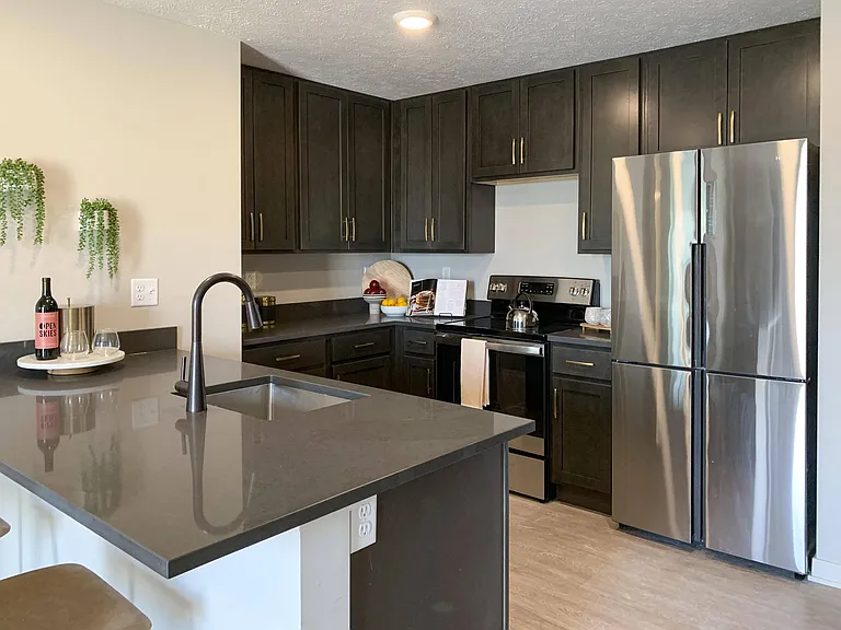 Our kitchens provide plenty of counter space and cabinetry, making meal prep and storage simple.
