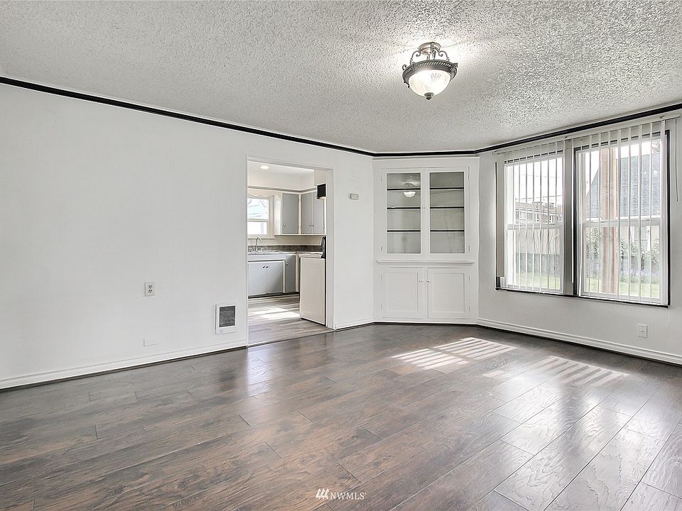 Lower unit formal dining room with built-in china cabinet. >