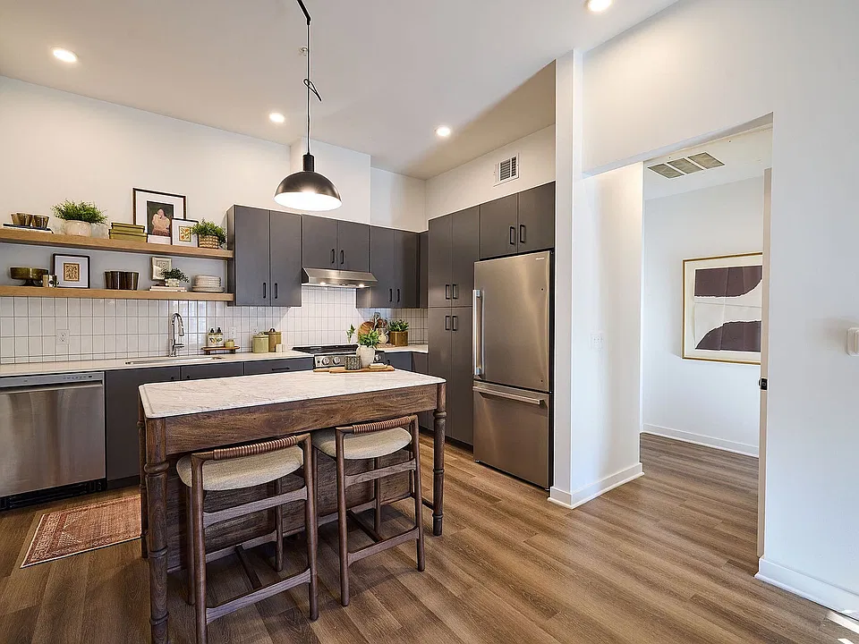 Modern kitchen with sleek dark cabinetry