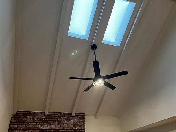 Living Room Vaulted Ceiling, Skylight, and Newly Installed Ceiling Fan