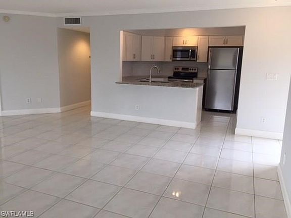 Open floor plan great room into new kitchen