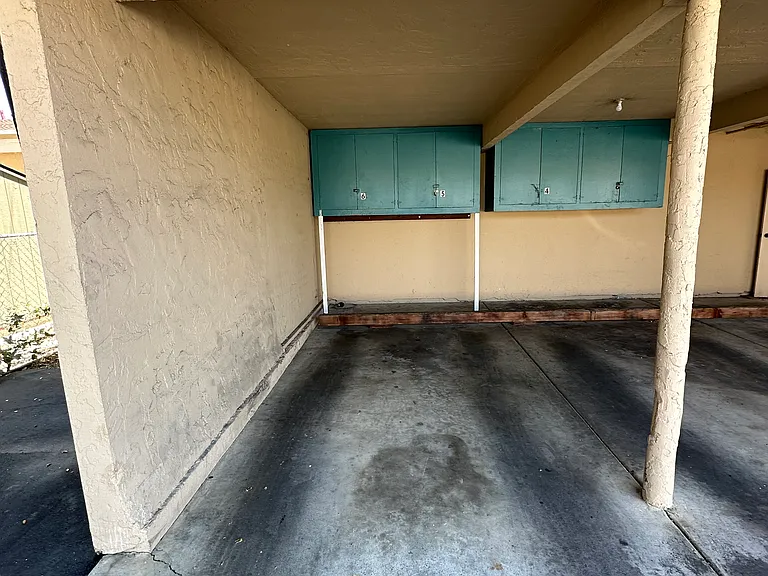 #6 Carport with storage cabinet
