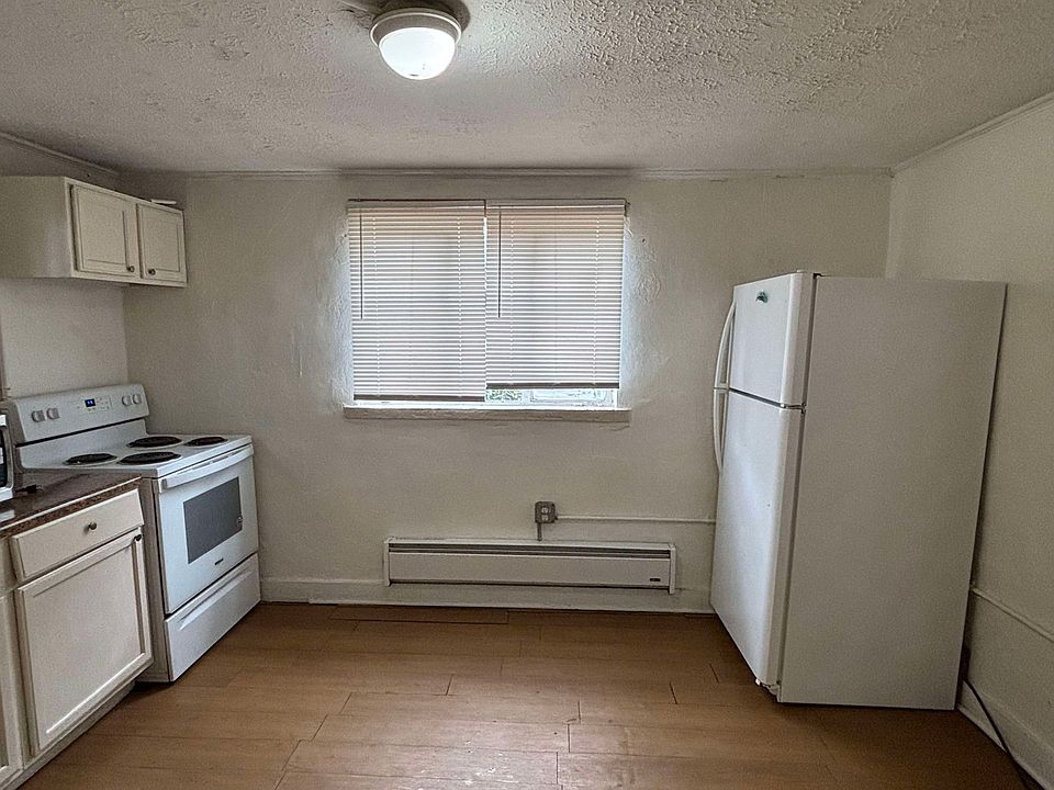Kitching/Dining Area with stove and refrigerator - 12'6" x 9'6"