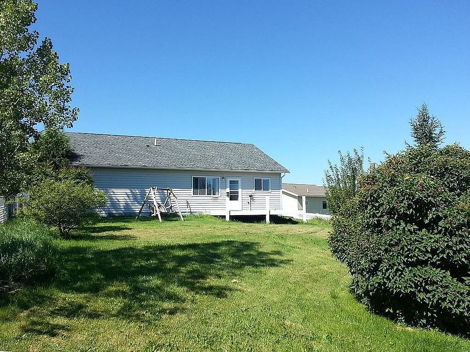 Back view of house and yard