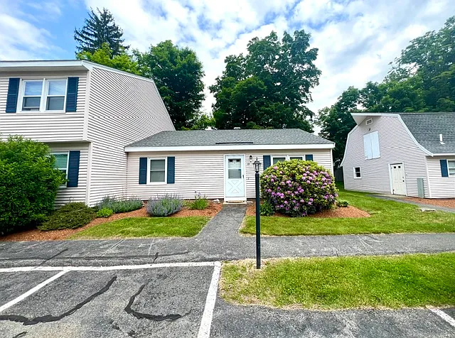 Unit #19 with Two Reserved Parking Spaces & Visitor Parking; Adjacent Storage Barn is Unoccupied