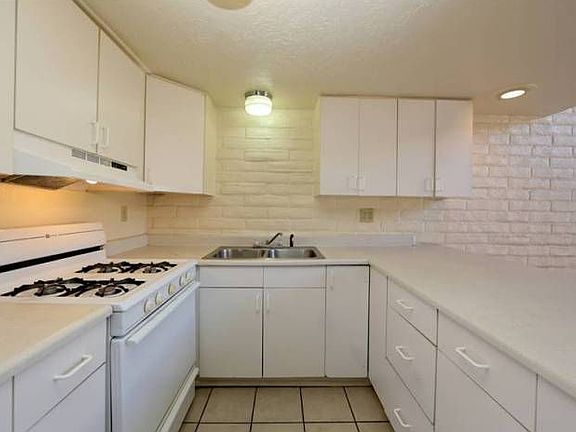 Bright tile floor kitchen