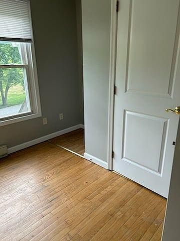 Bedroom corner & storage shelving nook.