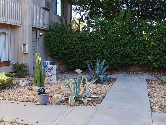 Landscape and walkway to unit