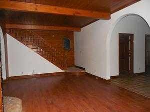 Large Wood-Beamed Living Room