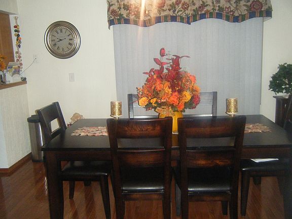 Dining area overlooks private backyard