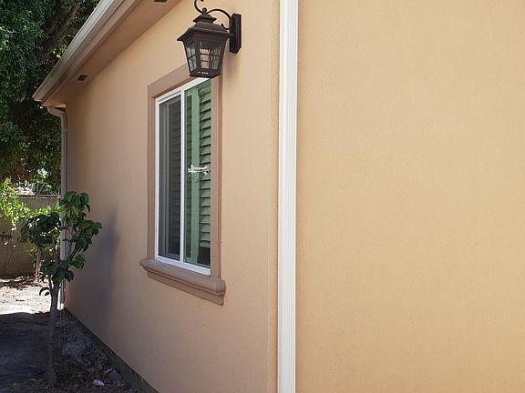 Front door and side yard