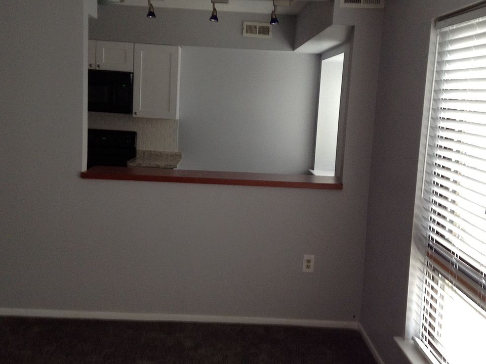 Kitchen counter overlooks livingroom