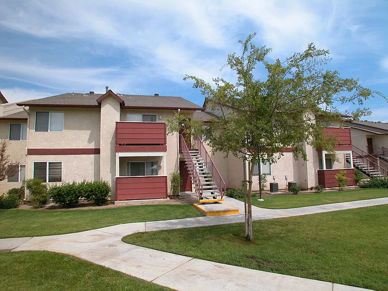 Building Exterior View From Grass Area
