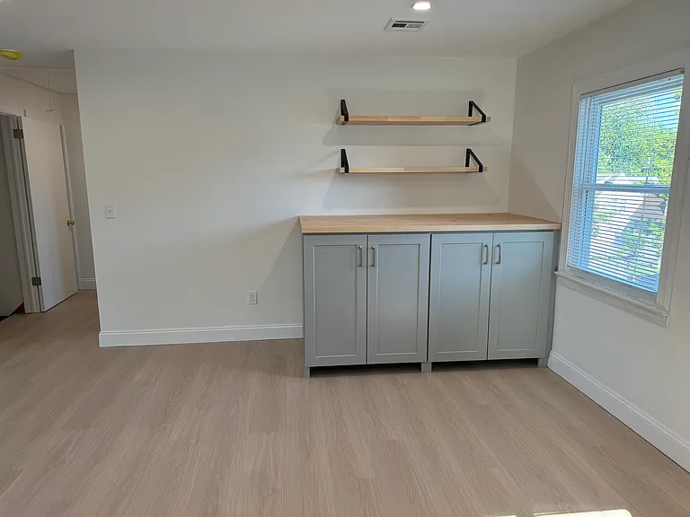 Custom cabinets perfect for folding laundry or entertaining :)