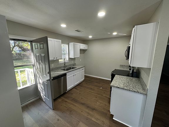 Kitchen with door to the back yard