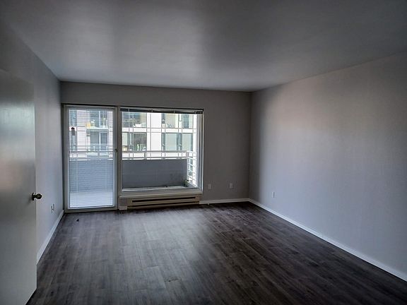 Spacious living room with access to balcony