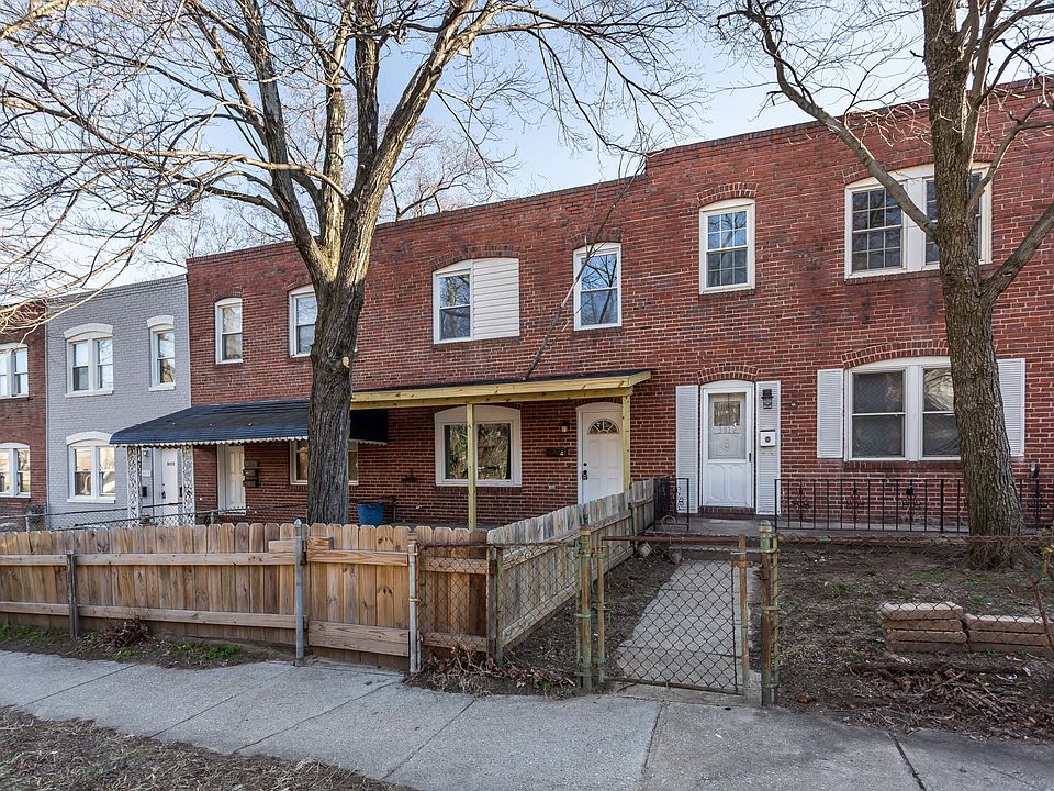 Exterior front with fenced yard