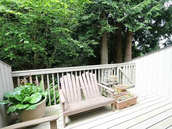 Private Patio Deck backing to trees and side yard