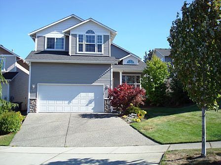 Must See! Beautiful 2 story home with 2 attached car garages 