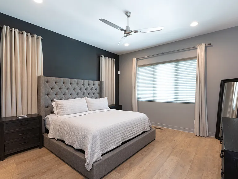 Large master bedroom with spacious walk-in closet. Master bathroom has both a large walk-in shower & tub for relaxation.