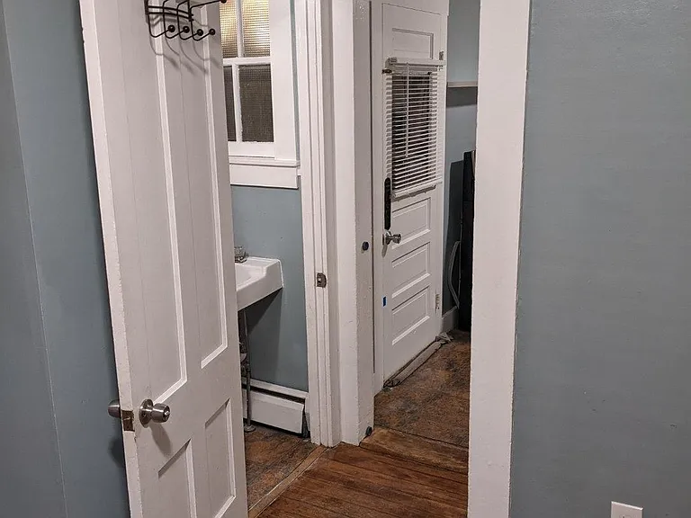 From the living room looking to bathroom and kitchen