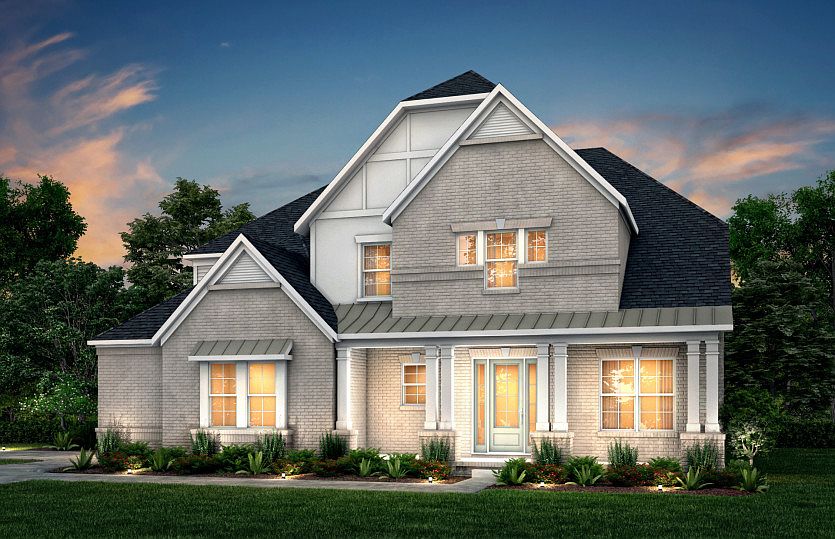 Barrington Exterior 11 features brick, hardie siding, covered front porch and 3 car sideload garage