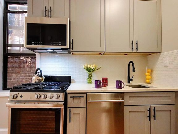 2nd image of 112 E 7th St APT 8